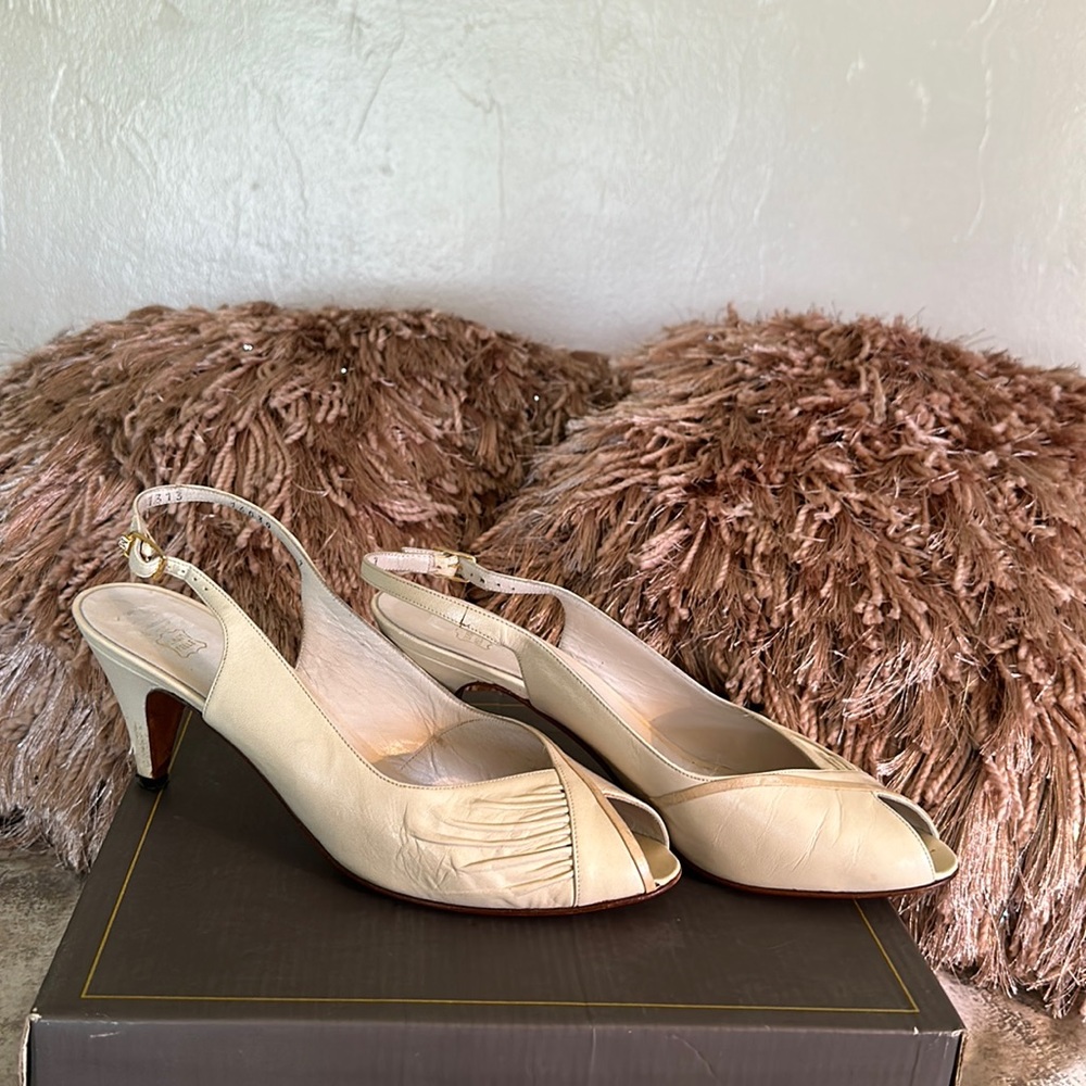 Vintage Bruno Magli open toed sling back pumps.